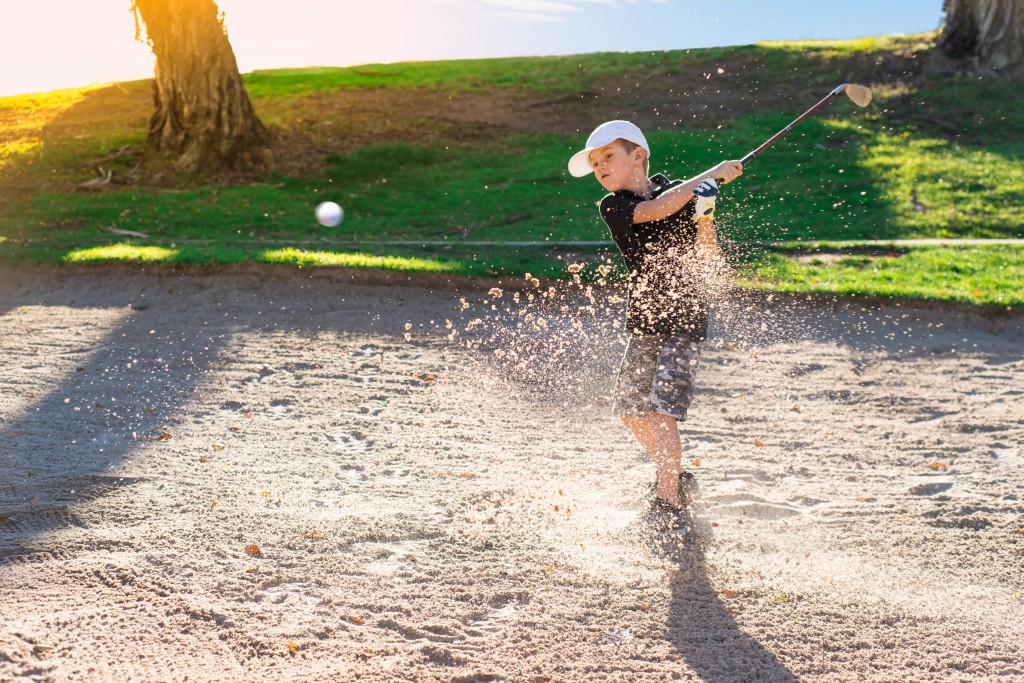 playing golf